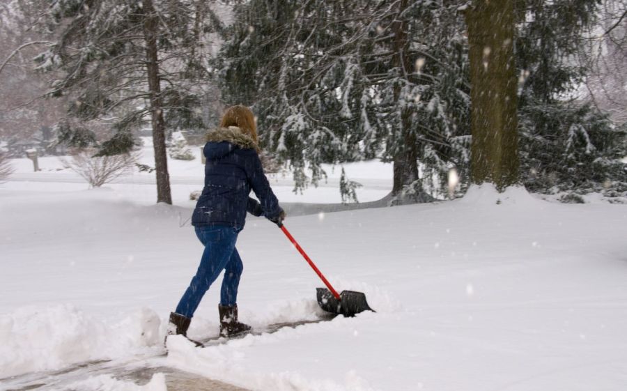 Volunteer shovelling snow Volunteer Kamloops Snow Angels Program